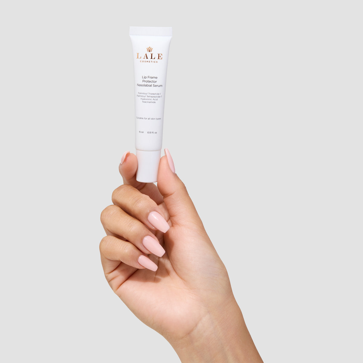 Lip Frame Protector Nasolabial Serum held in hand