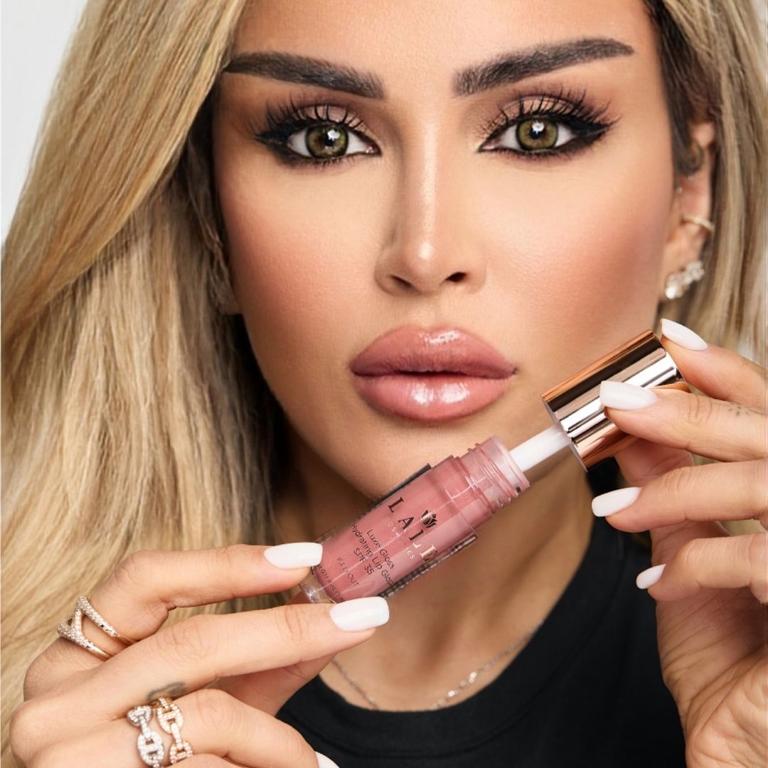 Dr. Laleh Mehrrafiee, DDS, holding Luxe Gloss in Iced Out