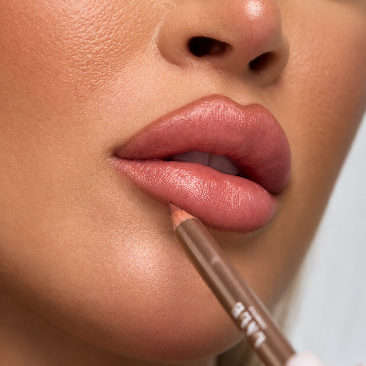 Always On Matte Lip Liner in Hot Gossip on lips