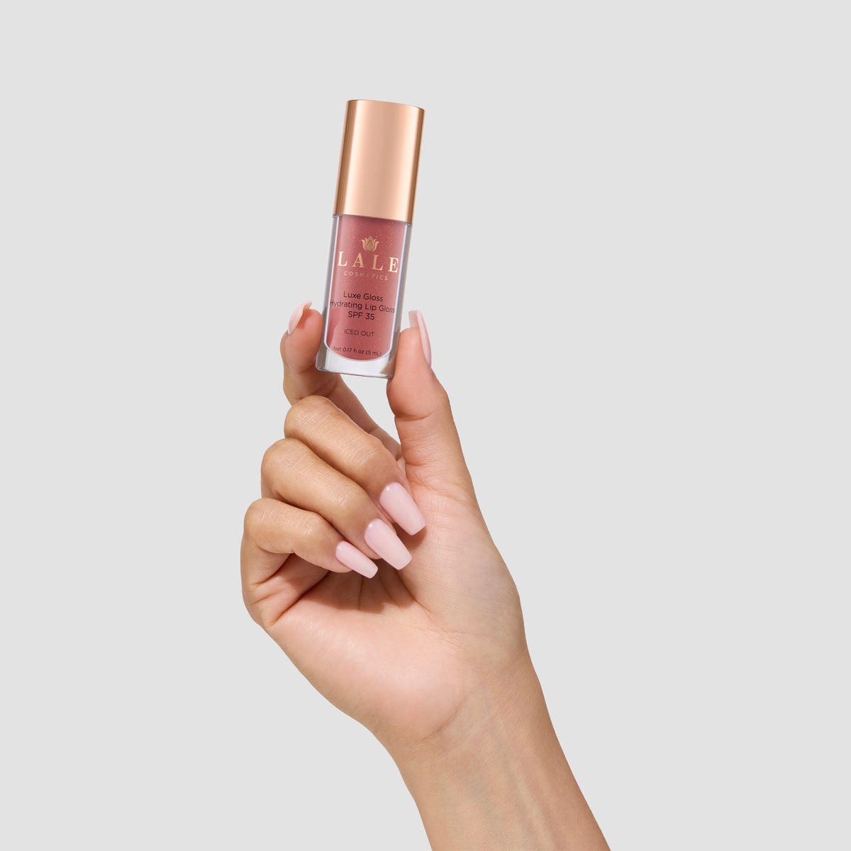 Luxe Gloss in Iced Out held in hand